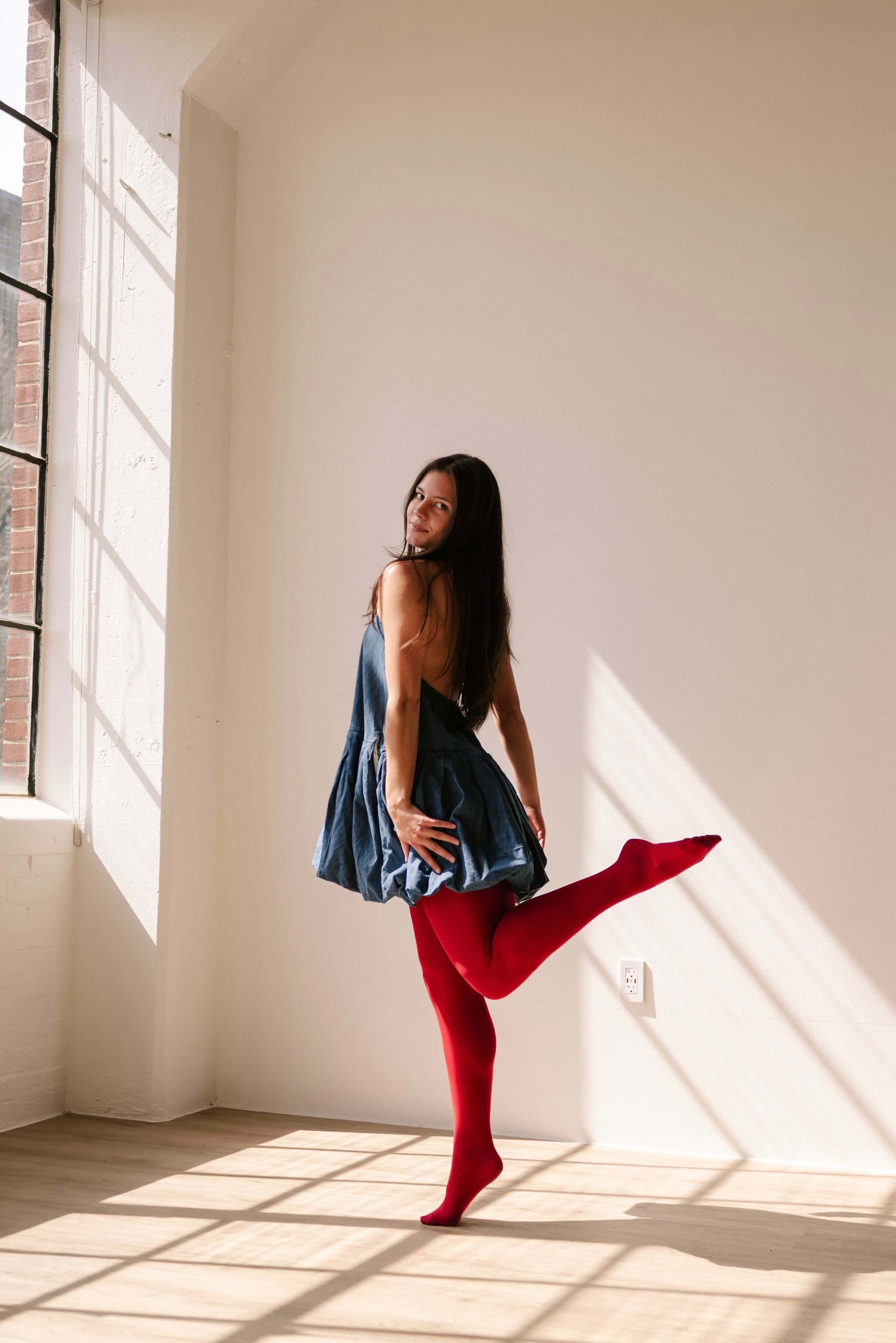 Dancer in a sunlit studio